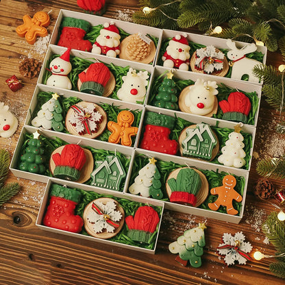 Original collection of rectangular Christmas candle gift boxes with sculpted festive candles and green paper filling.