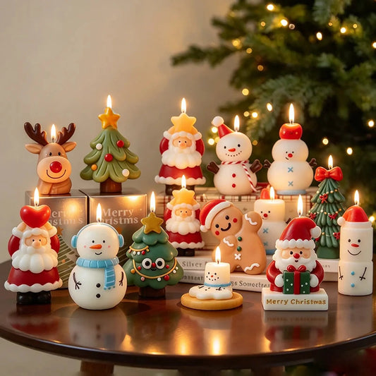 Christmas character candle collection with original packaging on a wooden table beside a Christmas tree.