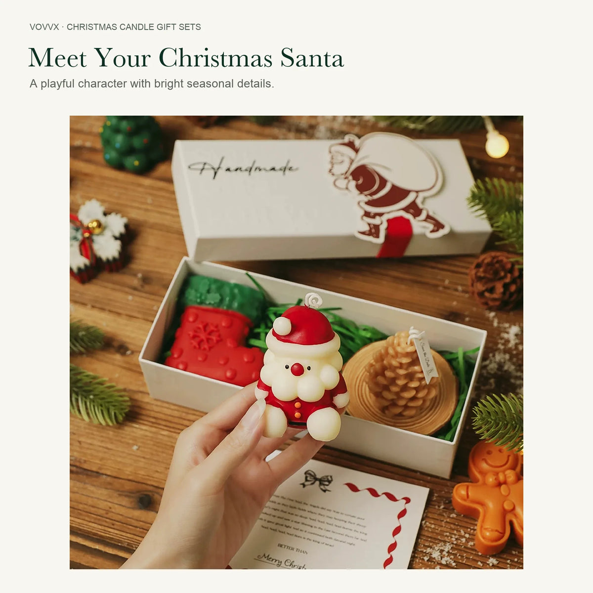Original Santa, snowflake and standing reindeer candle gift box held open beside a Christmas tree, showing the Santa-decorated lid.