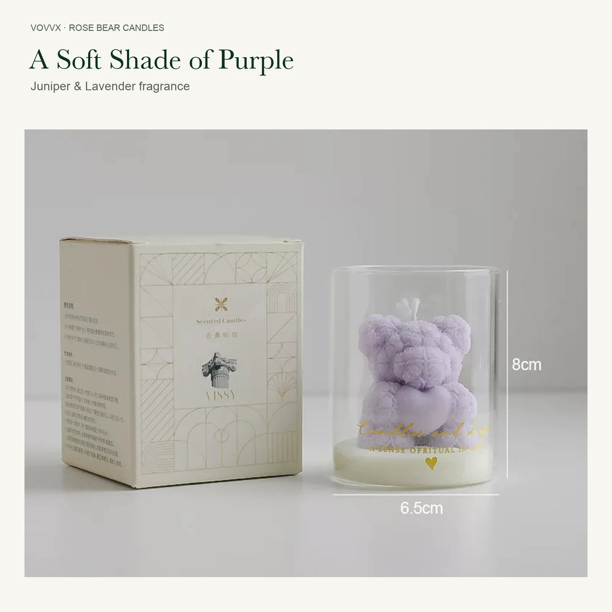 Original purple rose-bear candle beside its cream and gold printed box, with 8 cm height and 6.5 cm width markings.